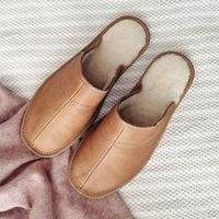 Classic and elegant tan leather men's slippers. Available in sizes UK8 to UK11 leather, wool