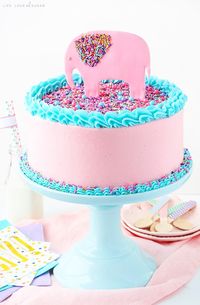 Strawberry Layer Cake full of fresh strawberries for flavor! Covered in sprinkles for a cute baby shower cake!