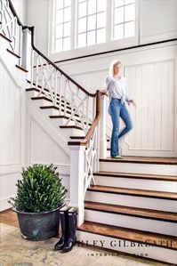ASHLEY GILBREATH INTERIOR DESIGN: Layers of tone on tone detail make this grand staircase easy on the eyes while at the same time a work of art itself.