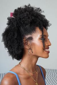 4C afro hair naturals on TikTok are fully embracing their shrinkage and we're here for it. The natural hair scene is a little too focused on perfect curls. Doesn't matter if it's S-shaped, coiled, or both — that pattern better be defined. And while we all like to indulge our crowns with that other kind of creamy crack (the one that doesn't burn) it can be a whole lot of work.