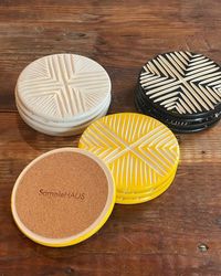 Diana the Potter on Instagram: "Who’s hosting the holiday party!? Did you get your coasters yet? Set the party right with these hand thrown & carved coasters. The patterns are mixed so alway know which drink is yours. 😉 Cheers! 🥂 Link in bio #coasters #ceramiccoasters #pottery #handmade #homedecor #samplehaus"