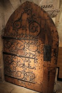 A beautiful old door inside the Cathedral at Wells, Somerset, England built between 1175 and 1490.