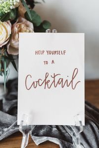 This adult Galentine's Day party has a '50 Shades of Grey' theme, so all the detail are super stylish: metallic calligraphy, velvety fabrics, and lots of candles. Click through to see all the Galentine's Day party inspiration and ideas! #galentinesday #galentines #galentinesdayparty #galentinesparty #galentinescocktail #galentinesideas #galentinesdecorations #girlsnight #galentinesdaythemes