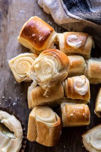These Salted Honey Butter Parker House Rolls are light, airy, buttery, perfectly salted, and SO delicious. Serve them warm right out of the oven with homemade honey butter for a dinner roll that’s melt in your mouth good. Incredibly quick and easy to make and uses just six everyday staple ingredients.