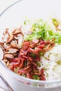 Apple Bacon Coleslaw - Super creamy, crunchy, and fresh! This coleslaw recipe only takes a few minutes to make and is packed with bright and delicious flavor! - #recipe by #eatwell101®