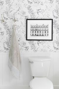 A whimsical, neutral kid's bathroom with mixed metals and wallpaper | Studio McGee Blog