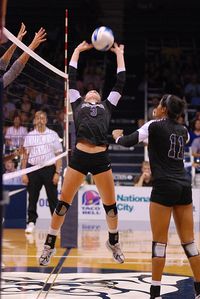 The setter back sets to the right side hitter in Zone 2.