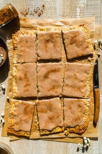 Your favorite festive childhood treat just got an upgrade with this homemade snickerdoodle pop tart recipe! Made with a classic brown sugar cinnamon pop tart base and topped with a cream cheese frosting, this recipe is the best sweet breakfast or nostalgic dessert that both kids and adults will love.