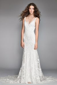 Corella's artistic V-neck is donned in complex Penta Embroidery while the back is lined with covered buttons that fade into the fit-and-flare silhouette.