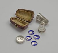 A George III Thimble Compendium with Scent bottle and Counter Box, unmarked, circa 1790, in red morocco case. Peter Cameron Antique Silver