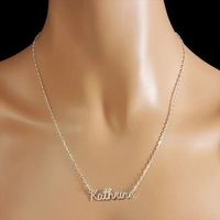 Personalized Sterling Silver Cursive Name Necklace Name should be up to 10 characters and first character will be upper case Dimensions: Measures about 1" wide and 0.7 mm thick Material: .925 Sterling Silver Chain size: 14" 16"18" 20" (your choice)