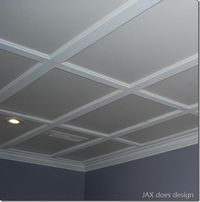 a drop ceiling that looks like a coffered ceiling.