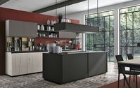 White aged oak | Matt lacquered smoke| Black anodised aluminium door | Matt lacquered tuscan red | Worktop: Fenix black
