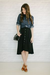 Black dress with dark wash chambray tied over the top. Cognac shoes. The simplicity of the silhouette makes this a great look- the chambray hits at just the right points.