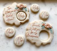These decorated sugar cookies are decorated to look vintage with pale pink and rose gold.