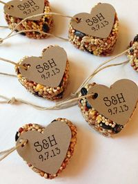 Heart-shaped bird seed feeder gift favors for guests. Card stock with verse; perhaps Matthew 6:26 about God feeding the birds.