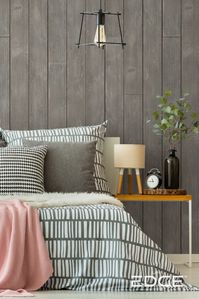 Redesign your bedroom into a peaceful sanctuary with the natural element of wood shiplap. This bedroom features our Rustic Gray shiplap.