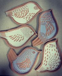 Marie Wingate on Instagram: "A little bird told me to make spoon rests/tea bag holder dishes for testing slip colors & carving designs. They certainly made me feel chirpy 🎶can’t wait to get them finished 😉👀🐦🎶🎵"