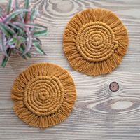 You can still protect your wooden tables without compromising on style with these macrame coasters handmade from 100% natural cotton.