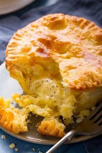 Buttery shortcrust pastry stuffed with a beautiful gooey cheese, potato and onion filling. A fantastic meat-free pie and comforting dinner.