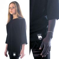Black unisex sweatshirt, Made in Italy, with 3/4 sleeves raw edges and minimal logo stitched at the bottom left. Round neck and drop shoulder. Relaxed fit. Material: 100% Cotton Garment Care: 40 degrees machine wash. Do not iron on logo.