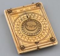 16TH CENTURY GERMAN IVORY BRASS DIPTYCH SUNDIAL German ivory gilt-brass diptych sundial used as an early timekeeper. On the reverse a German lunar volvelle with central brass disc, the disc has crescent moon with face. There are directions in German on how to use the compass.
