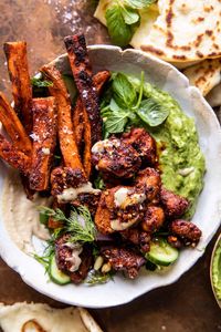 Sheet Pan Lemon Chicken with Sweet Potatoes and Avocado Goddess Sauce | halfbakedharvest.com