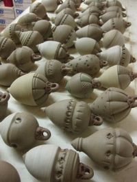 Hand thrown ornaments-Or pinch pot rattles! ornaments two halves connected?