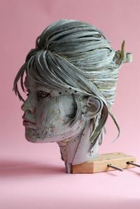Scott Fife uses cardboard, glue and screws to transform the ordinary into the absolutely extraordinary. Love this head of Brigit Bardot