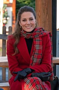 Kate Middleton Looks Festive In Jaw-Dropping Red Coat And Plaid Skirt Combo During Royal Tour | The Daily Caller