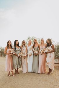 Want a wow factor for your bridal party? Mixing and matching bridesmaids creates a unique and effortless look that all your bridesmaids will love! Our luxe satin champagne, rose gold, and green moss bridesmaids dresses will have your girls looking amazing on your big day!
