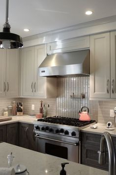 Contemporary Kitchen Vertical Tiles Are A Perfect Accent For The Contrasting Design Craft Cabinetry With Shades Of Grey Porcelain Gl Running Bond Backsplash Tilebath