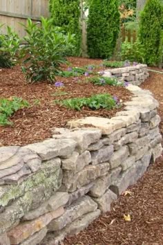Dry Stacked Stone--raised borders to separate beds from grass