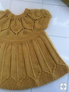 Bir bebek elbisesi için desen yapmanın kolay yolu Bir bebek elbisesi için desen yapmanın kolay yolu