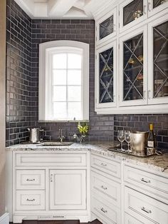 White Kitchen With A Black Subway Tile Backsplash Backsplashes Traditional Kitchen Modern Backsplash Cabinets Subway Tiles