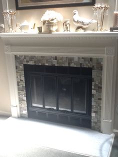 Installing Pebble Tile In Your Builder-Basic Fireplace Surround | Tiled fireplace Pebble tiles and Fireplace surrounds