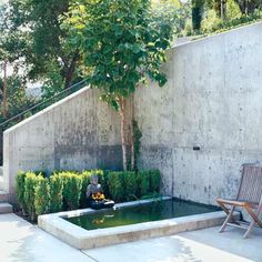 Photo: Tim Street-Porter | thisoldhouse.com | from All About Retaining Walls. Nice concrete look