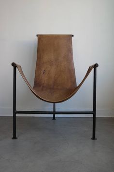 an updated version of the classic acapulco chair handcrafted in