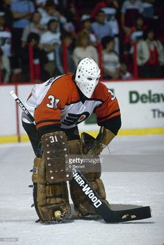 swedish ice hockey player pelle lindbergh goalkeeper for the flyers bruins player hits flyers goalie in face mask
