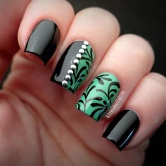 Dark green nail design