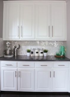 white kitchen cabinets with black countertops modern at home with kara whitten kitchen backsplash white cabinetskitchen black countertopsdark budgeting tips for renovation blogger projects we white kitchen cabinets with black countertops modern at home with kara whitten kitchen backsplash white cabinetskitchen black countertopsdark budgeting tips for renovation blogger projects we