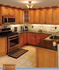 What Paint Color Goes With Light Oak Cabinets Kitchen Colors Look At The Backsplash And Lighting Sandstone Rope Kitchen Solid Birch Wood Door Cabinets By Cabinet Kings
