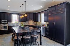 large traditional kosher kitchen with dark cabinets and dark countertops in - What Is A Kosher Kitchen large traditional kosher kitchen with dark cabinets and dark countertops in - What Is A Kosher Kitchen