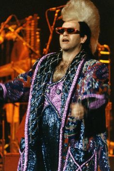 Nanette+looks like the sunglasses are an Alain Mikli Elton John Costume, Bernie Taupin