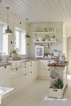 White Cottage Farmhouse Kitchens Country Kitchen Designs We Love Kinda Like The Two Lights Above Countertops Country Kitchen Ideas Farmhouse Style Small Cottage