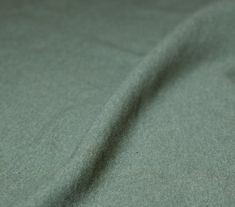 Fabric cotton polyester elastane single jersey pastel turquoise mottled roughened winter-sweat