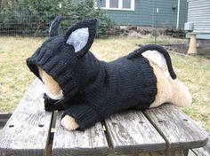 Super cute hand-made knitted dog sweater with mouse ears and tail.