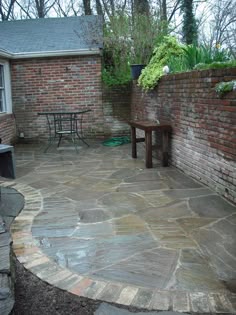 Flagstone Patio Pavers With Brick Privacy Wall Perfect For City Living Flagstone Patio Pavers With Brick Privacy Wall Perfect For City Living