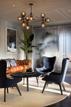 living room modern black grays chandlier glass leather