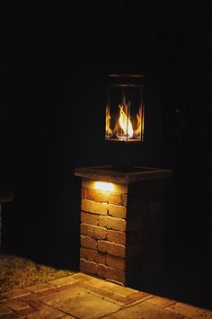 11 Delightful The Tempest Torch By Travis Industries Images Tempest Torch Gas Lantern Sitting On Top Of Stone Pillar
